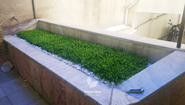 نمونه کار | اجرای باغچه مصنوعی برای زیباسازی پارکینگ  مجتمع مسکونی
